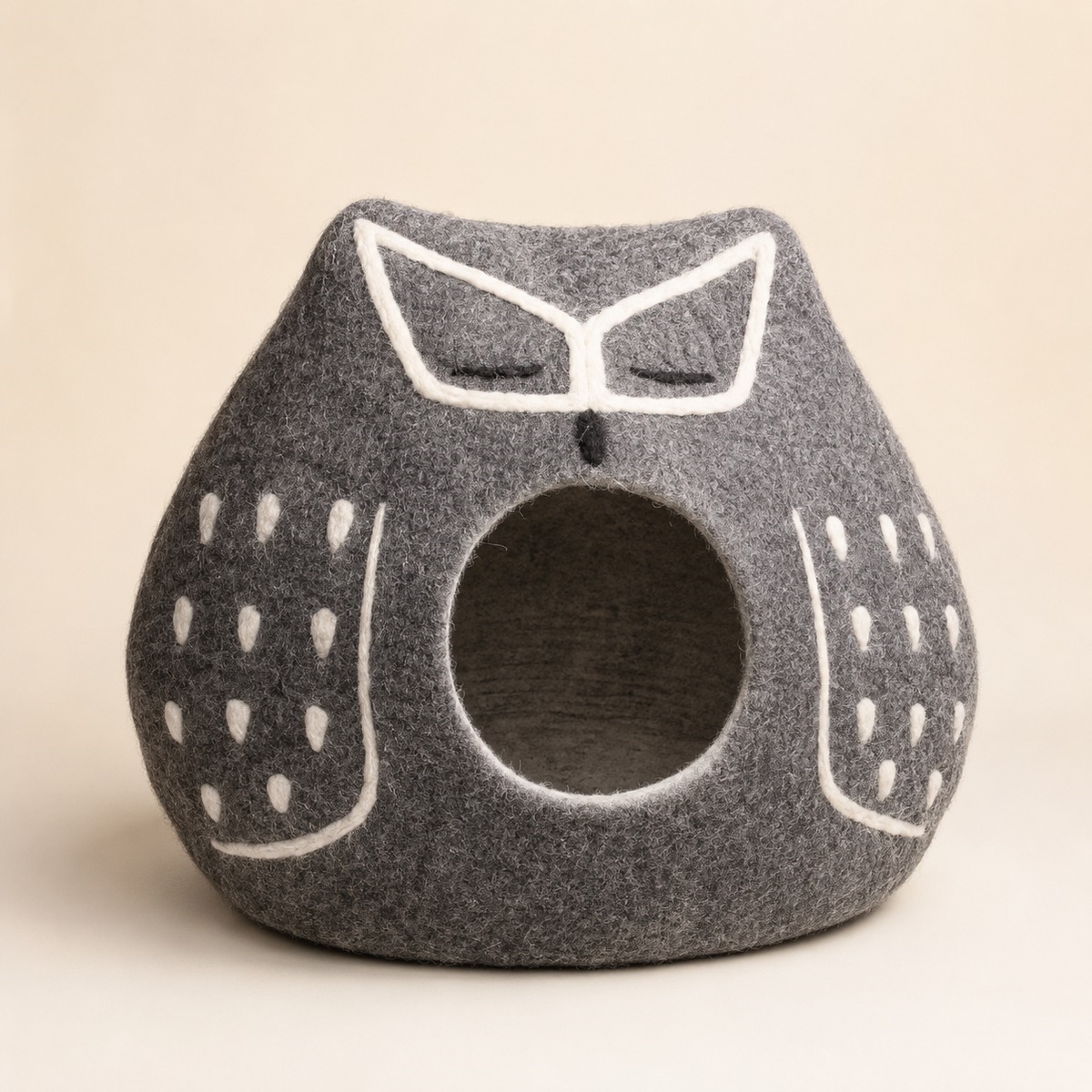 Custom Felt Pet House - Gray Owl Pet Cave Gray felt owl-shaped pet house with a round entrance, handmade wool pet cave